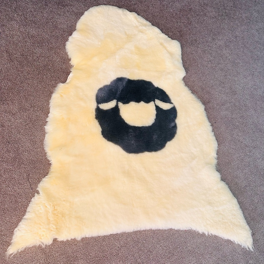 Lightweight, Luxurious Cream and Black Sheepskin Rug
